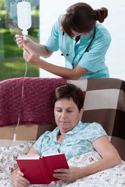 Nurse Keeping Drip-bag for Old Women